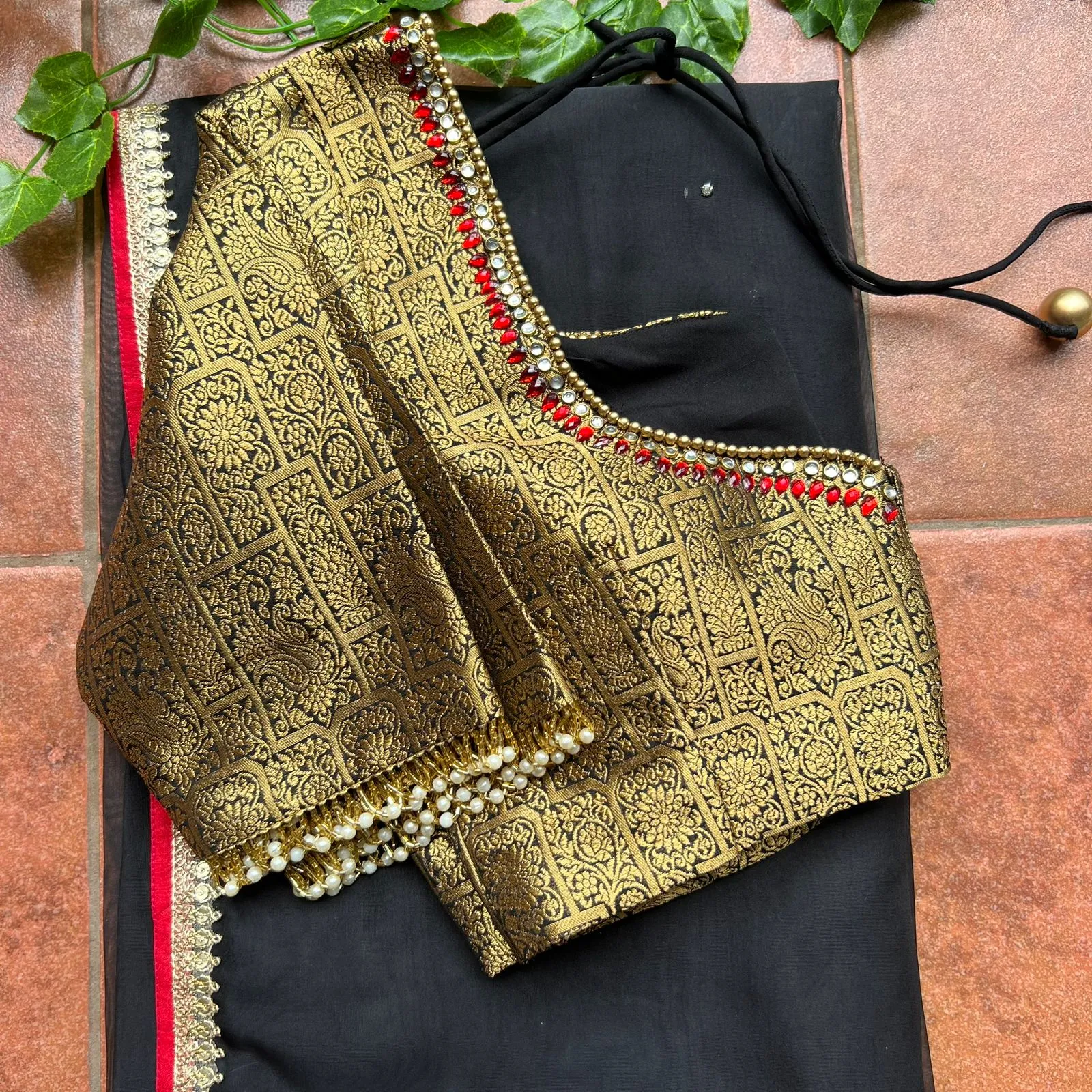 Black silk saree with kanjivaram handwork blouse