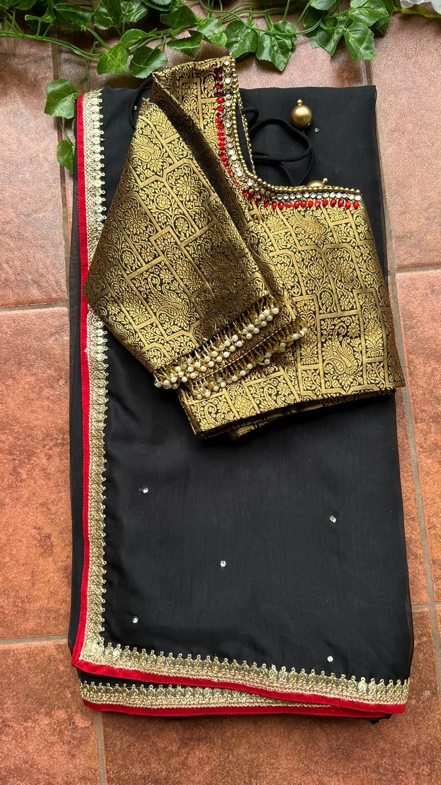 Black silk saree with kanjivaram handwork blouse