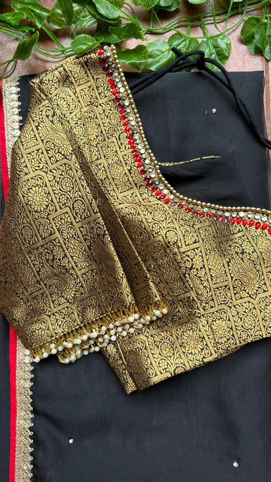 Black silk saree with kanjivaram handwork blouse